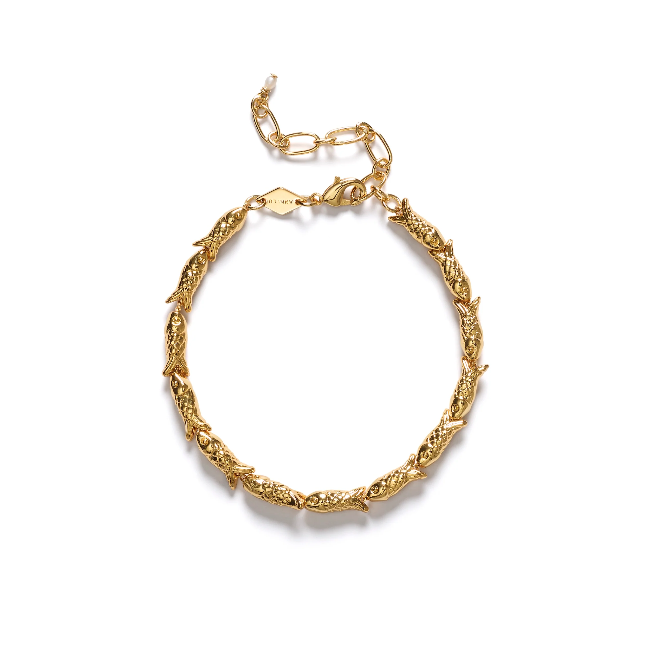 262-10-07-fishy-bracelet-gold-pack_WEB.webp